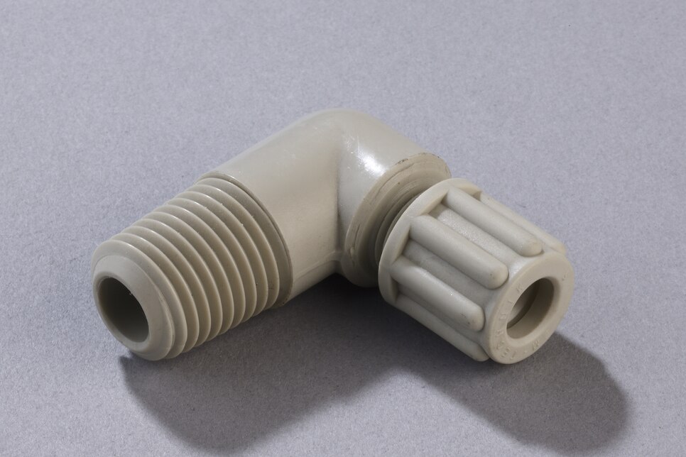 Oblique view of horizontal Male Elbow Connector WE PP, DN4/6 - NPT1/4"