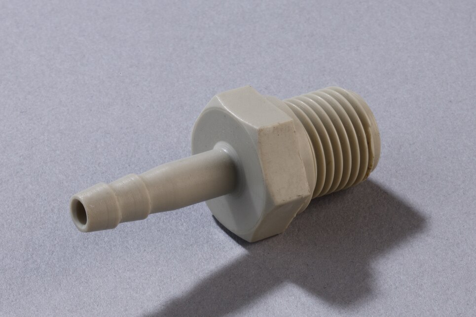Oblique view of horizontal Straight Male Connector with Barbed Fitting ST PP, DN4 - G1/4"