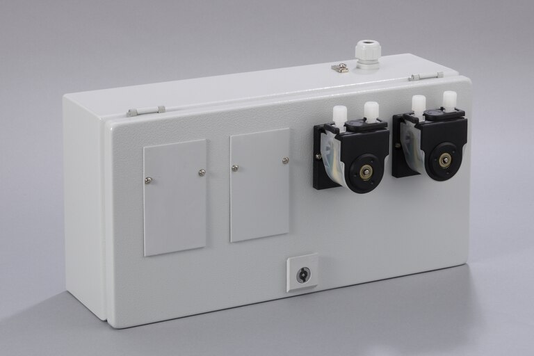 Oblique view of 2 Peristaltic Pumps SR25.1/Ex-G in a stainless steel enclosure