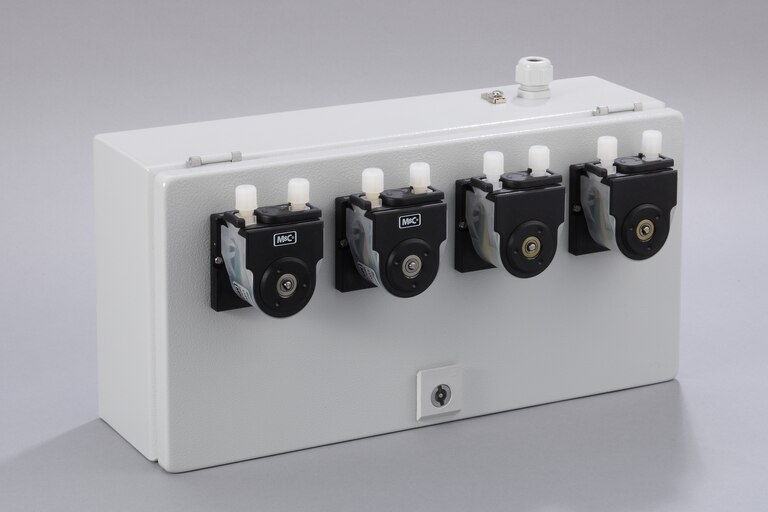 Oblique view of 4 Peristaltic Pumps SR25.1/Ex-G in a stainless steel enclosure